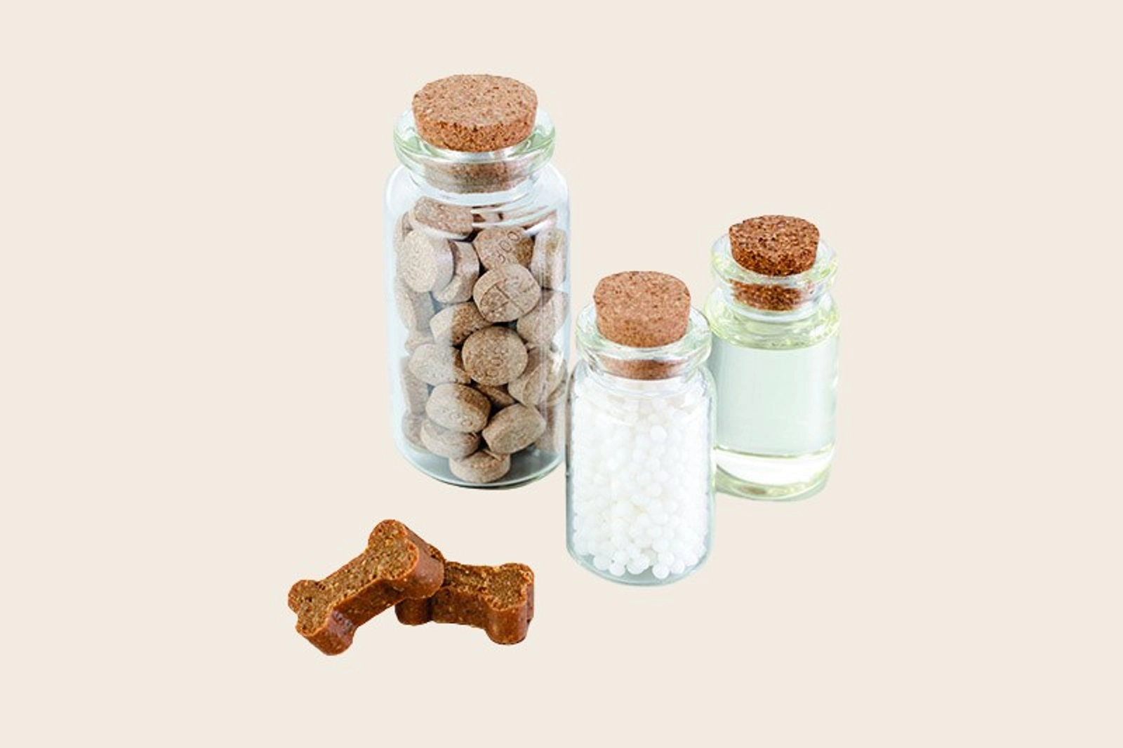 Glass jars of natural pet treats and supplements with cork lids